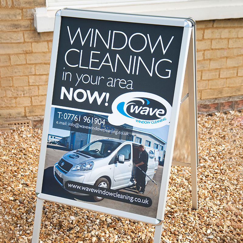 Wave Window Cleaning pavement sign
